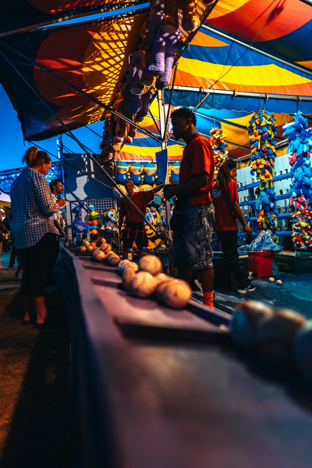 group of people standing beside market