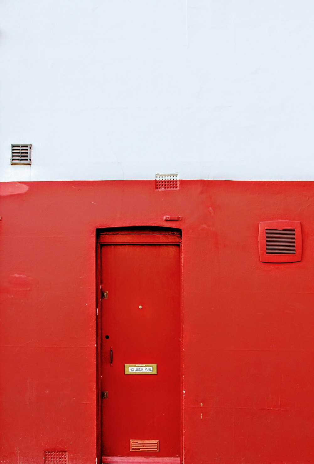 red metal plush door