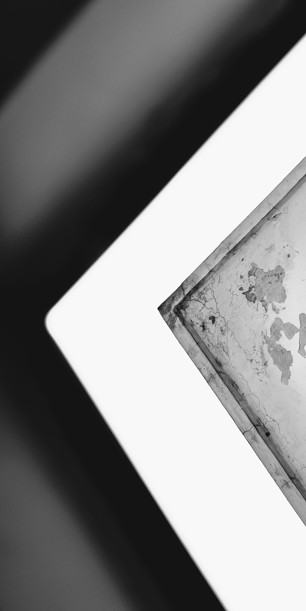 white photo frame on black surface