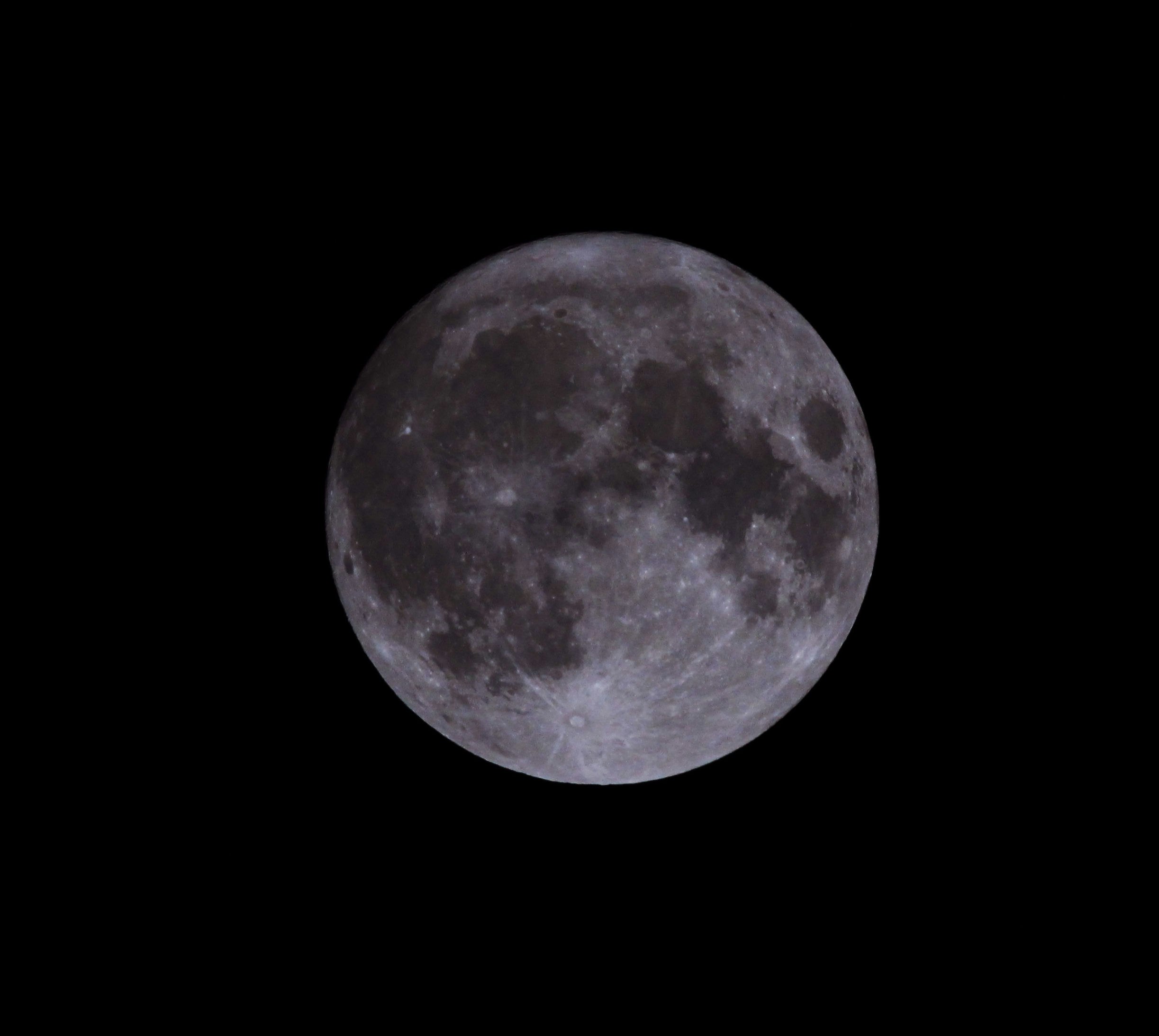 full moon in dark night sky