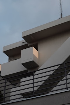 Institutional building with clean lines and concrete facade in progress.