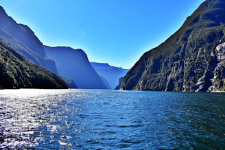 View of Mangla Lake shimmering under a clear blue sky from Mirpur side.