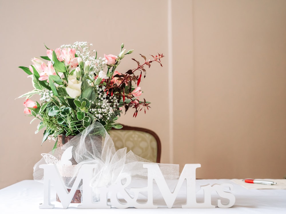 a bouquet of flowers sitting on top of a table