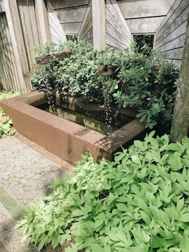 Wooden garden fountain crafted and installed by hand