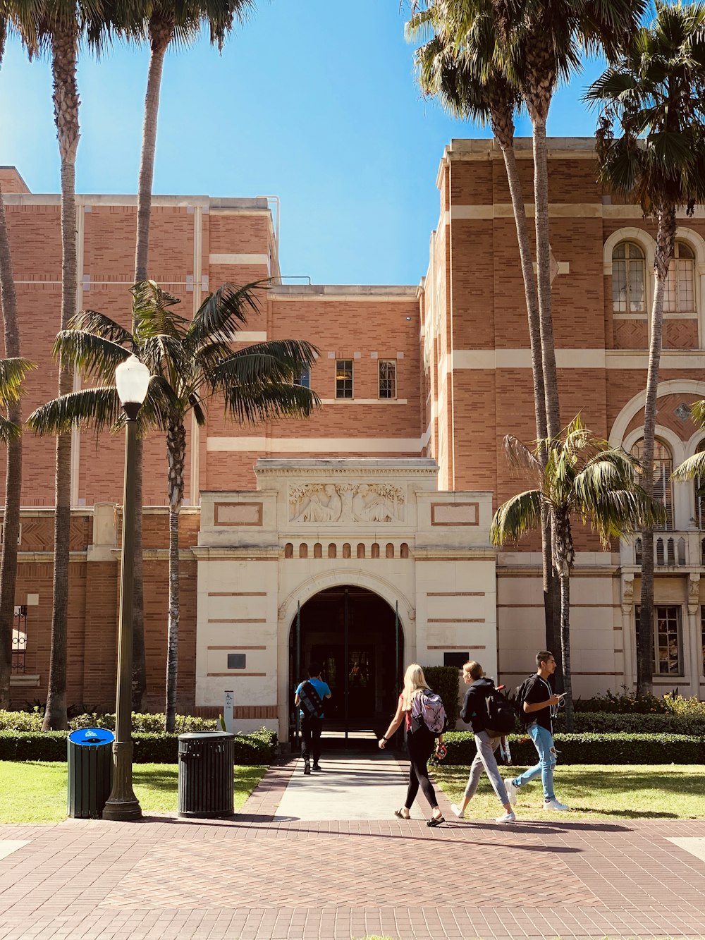 people walking near building