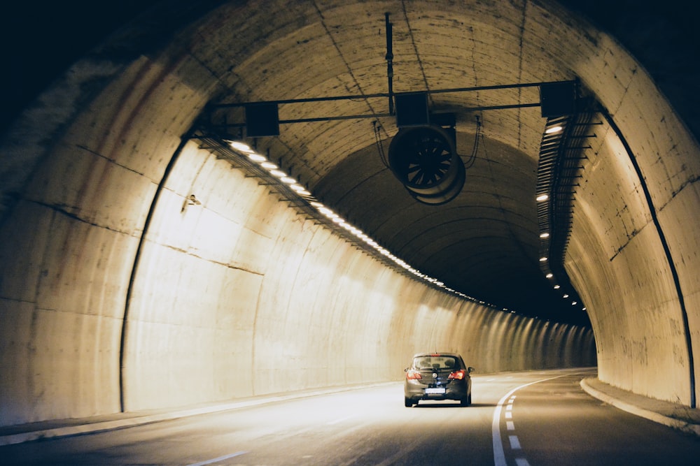 car moving towards tunnel