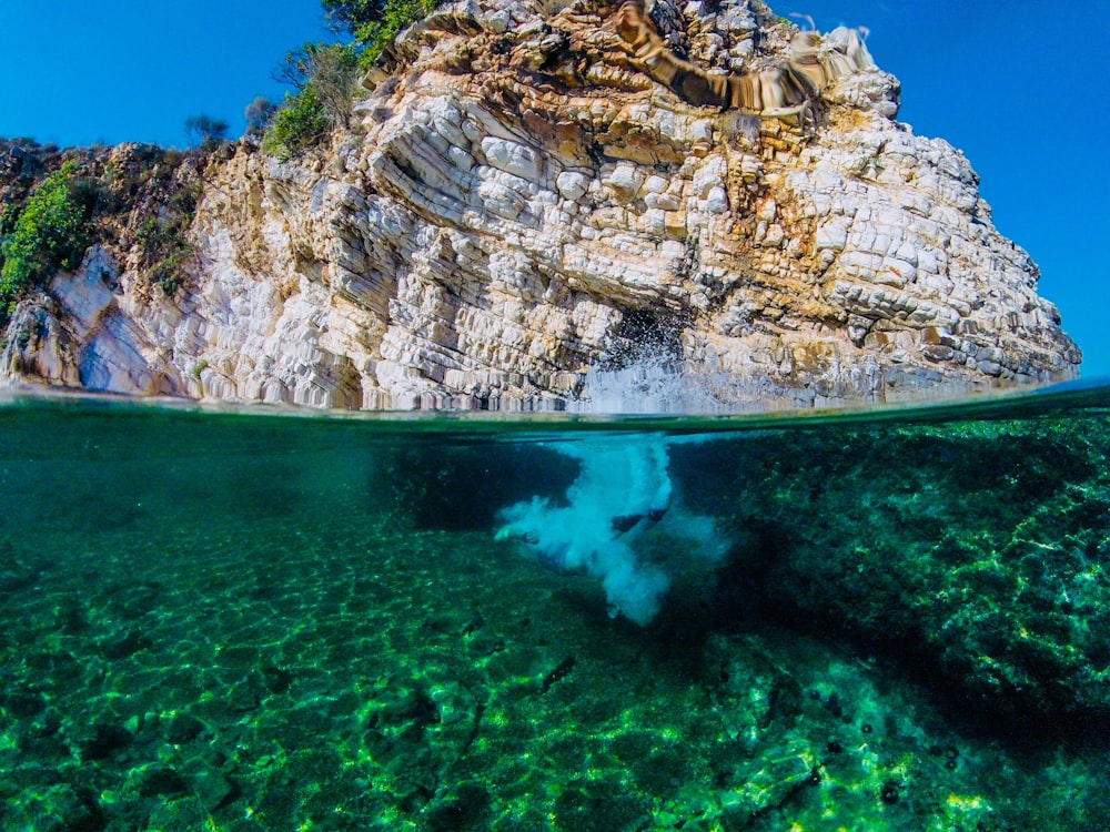 body of water near mountain