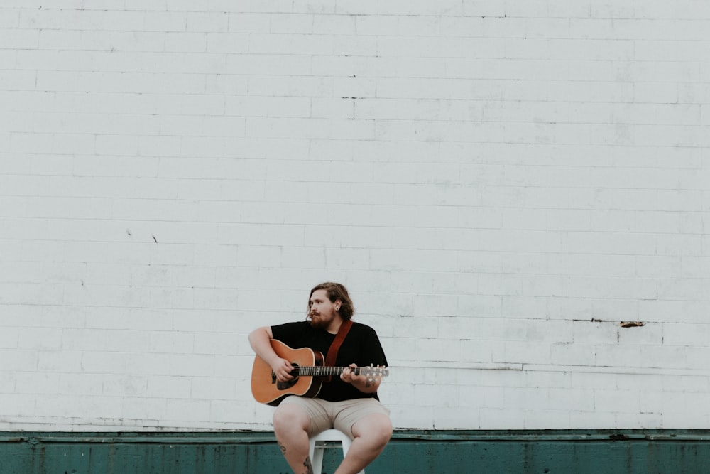 man playing guitar