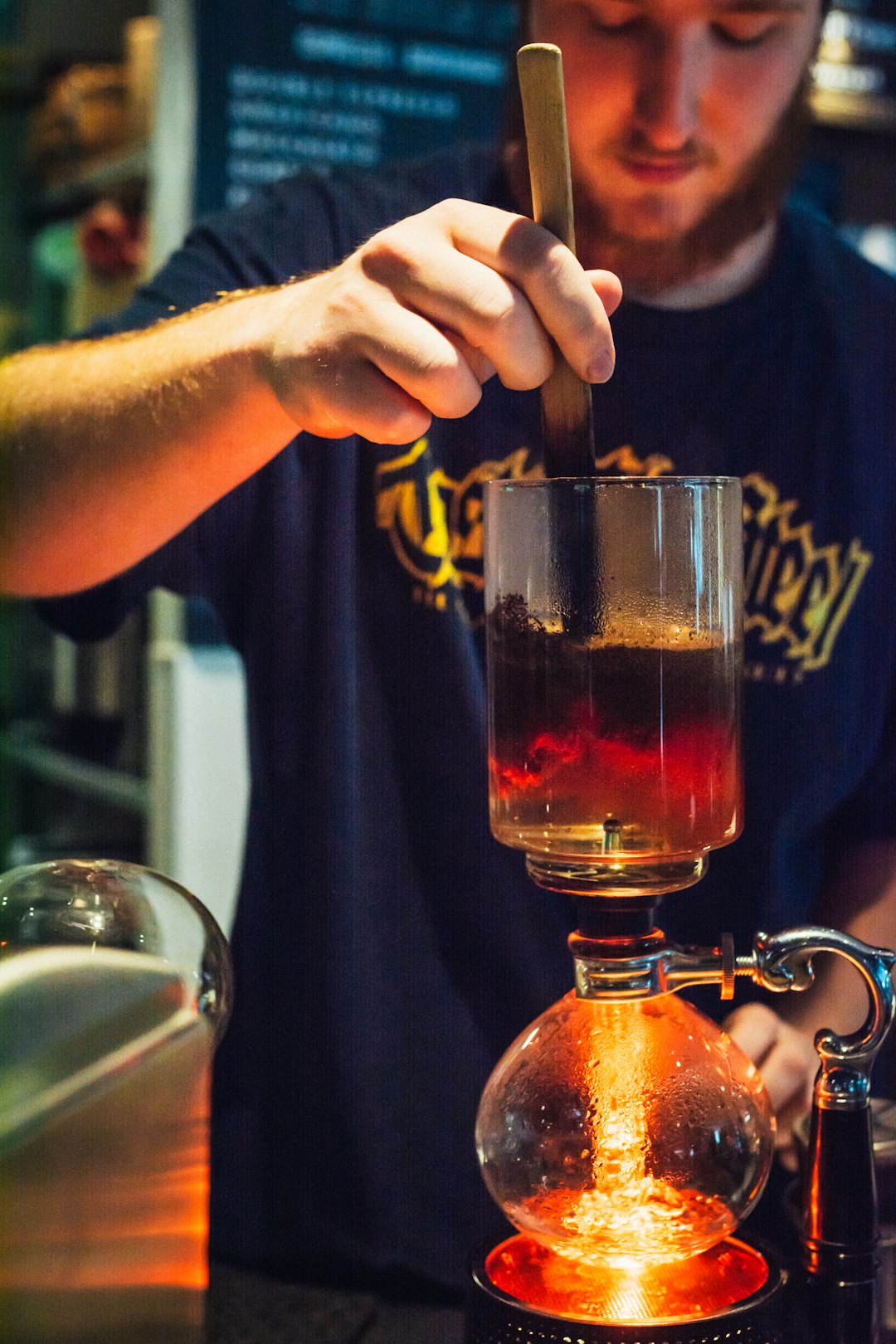 man mixing drink