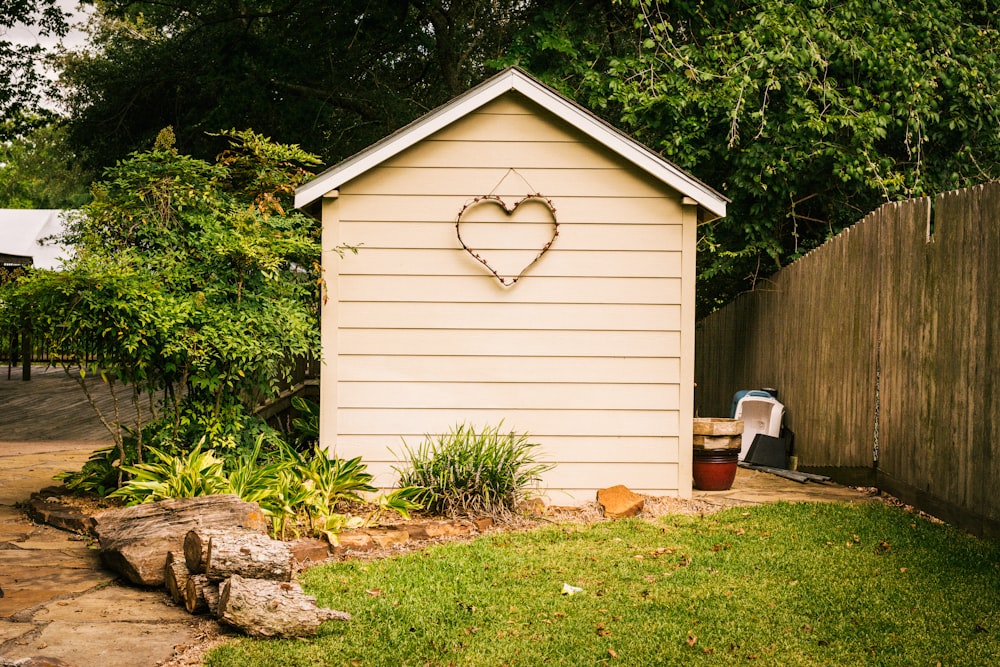 a shed with a heart on the side of it