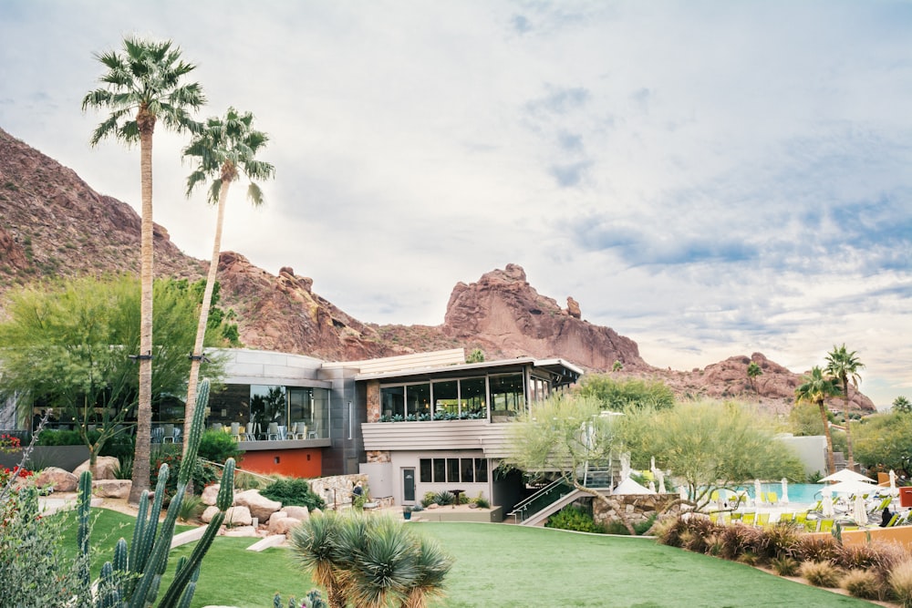 gray house beside mountain