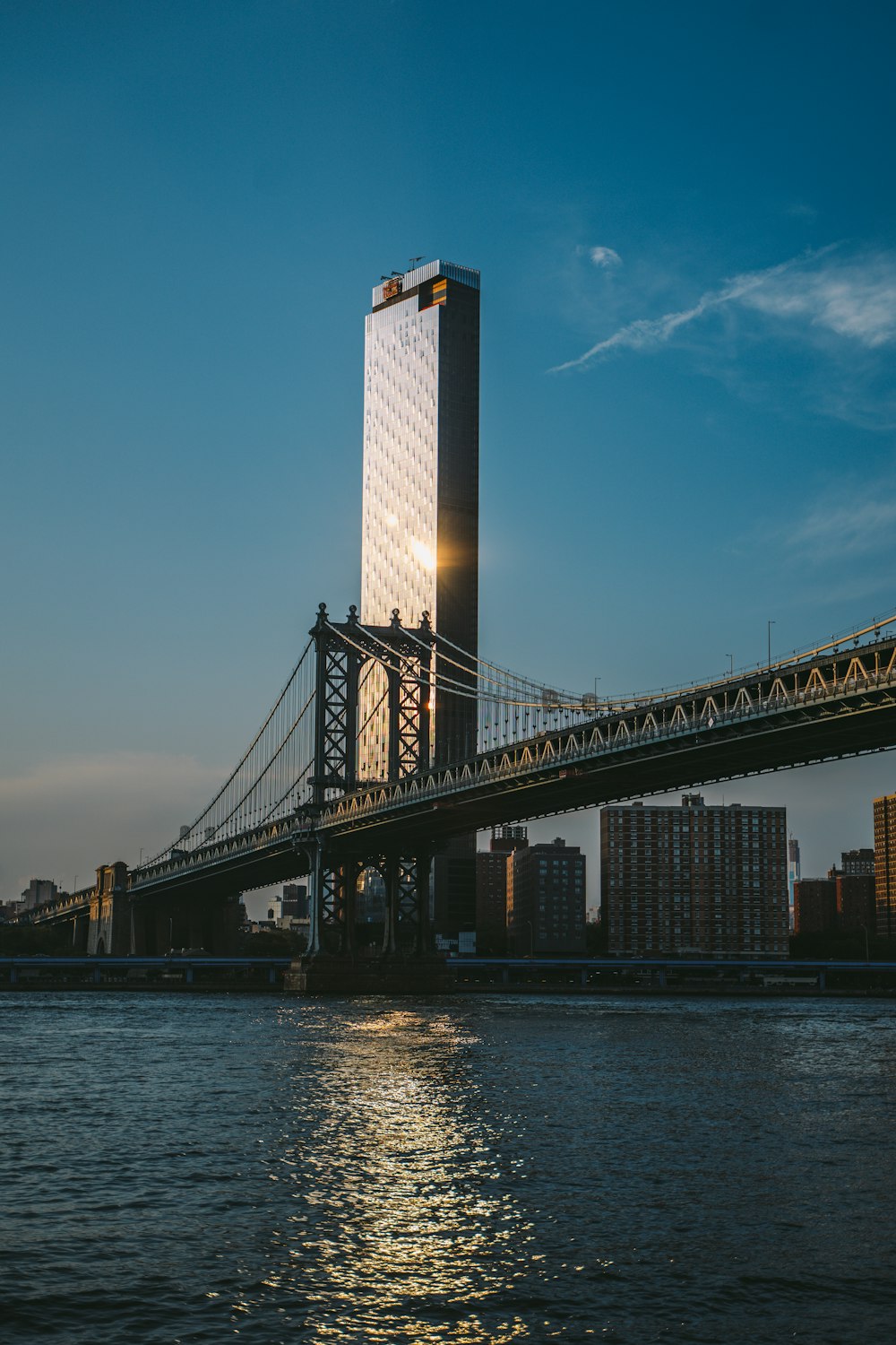 buildings near bridge during daytime