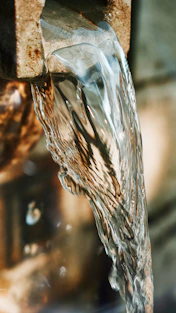 macro photography of flowing water