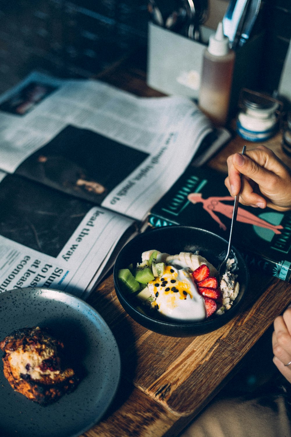 person about to pick food from bowl