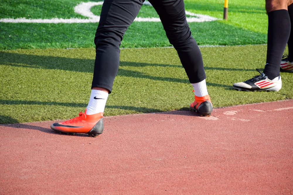 person wearing Nike cleats