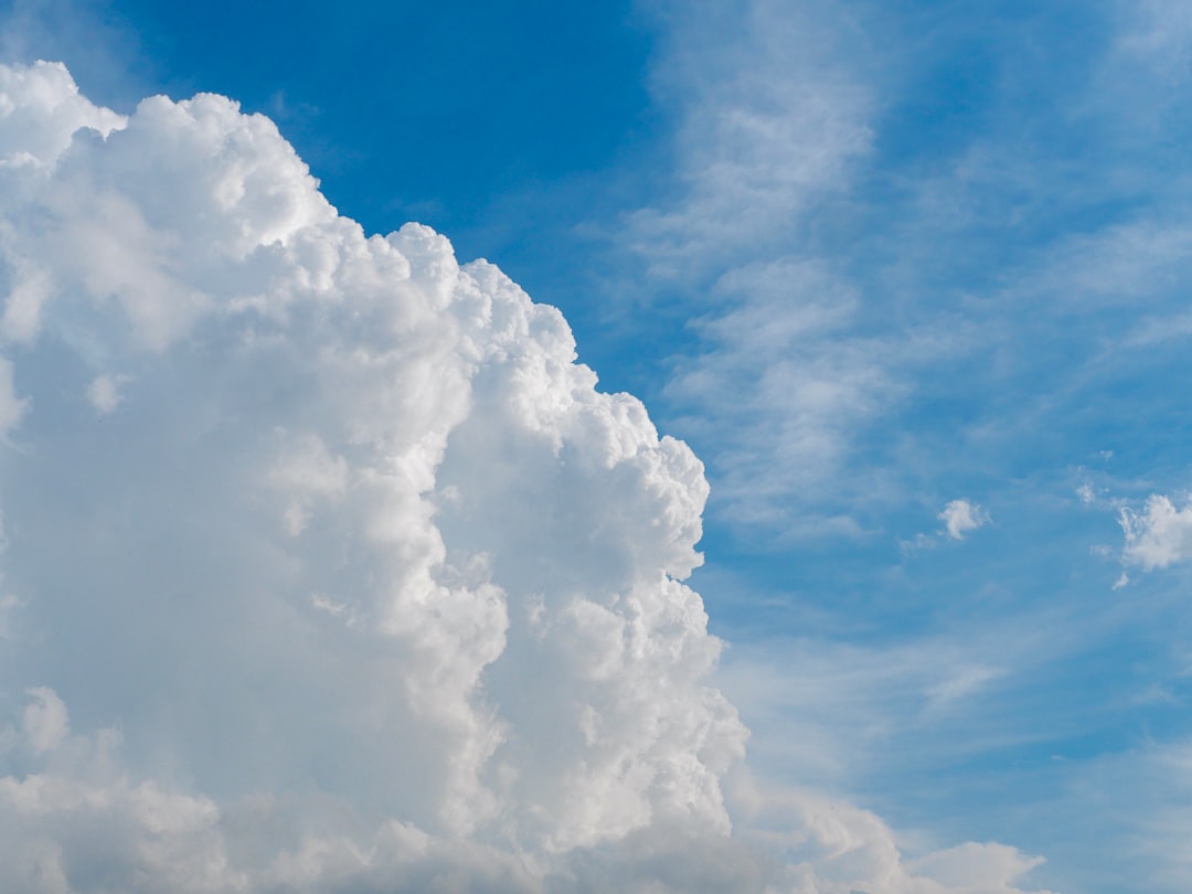 white and blue cloudy skies during daytime