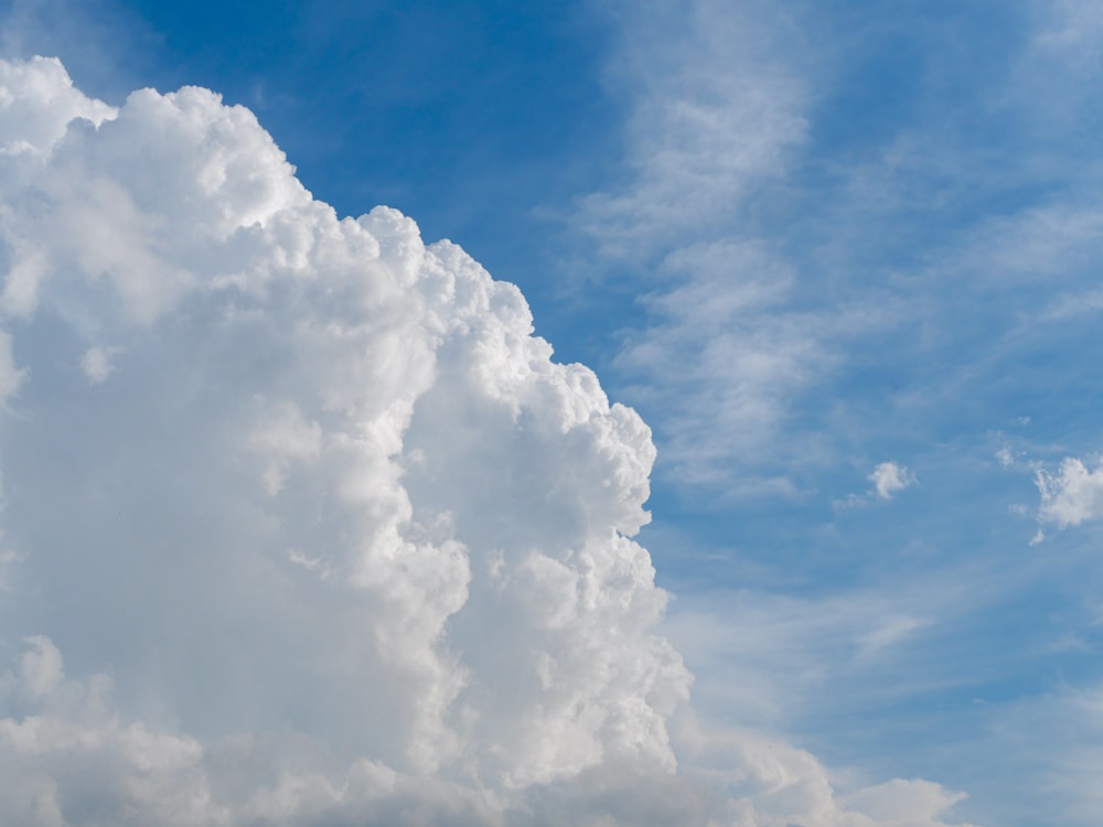 white and blue cloudy skies during daytime