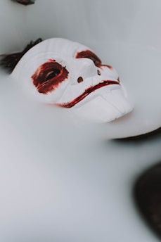 person's face covered in paint