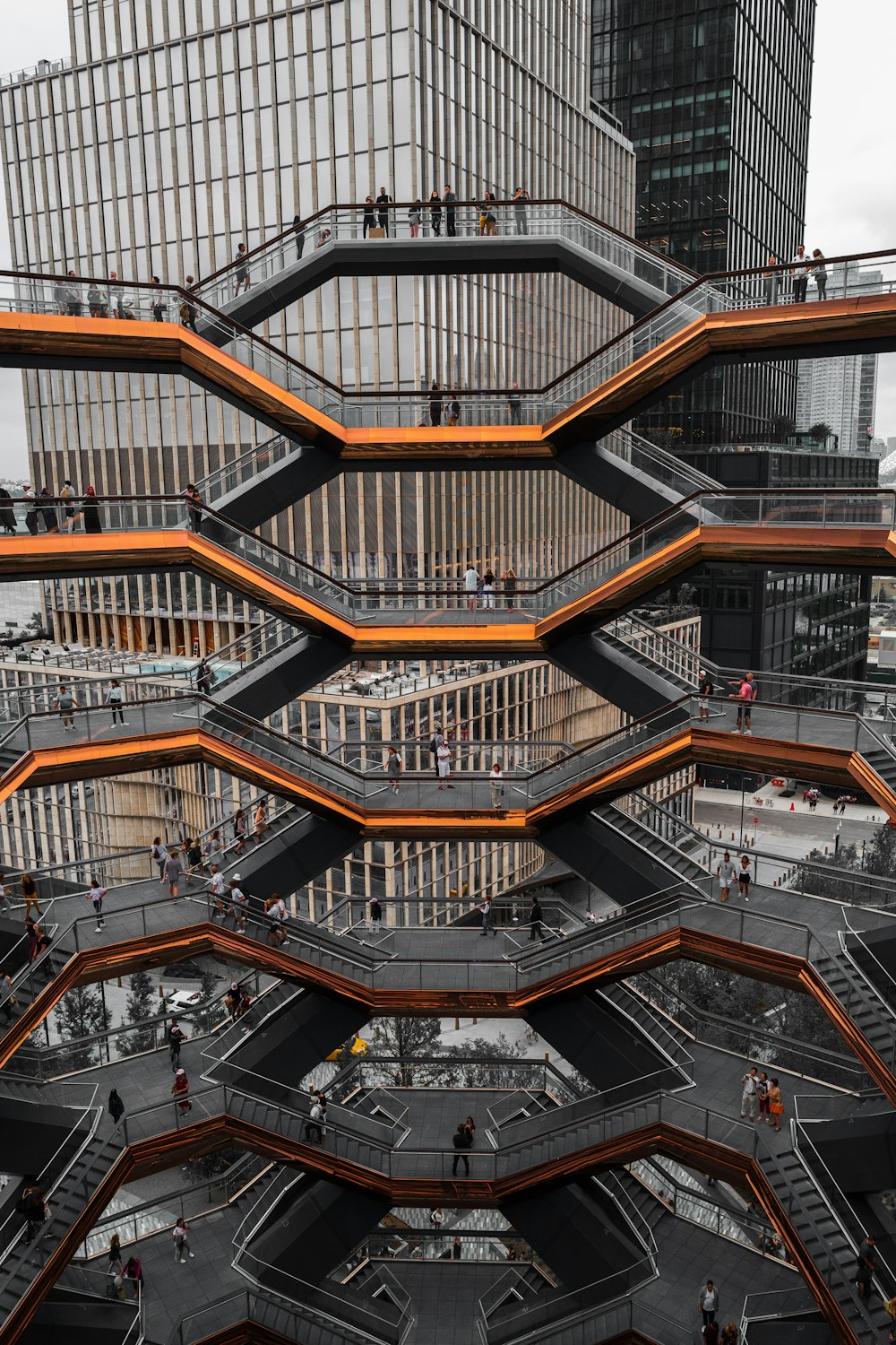 people in escalator structures