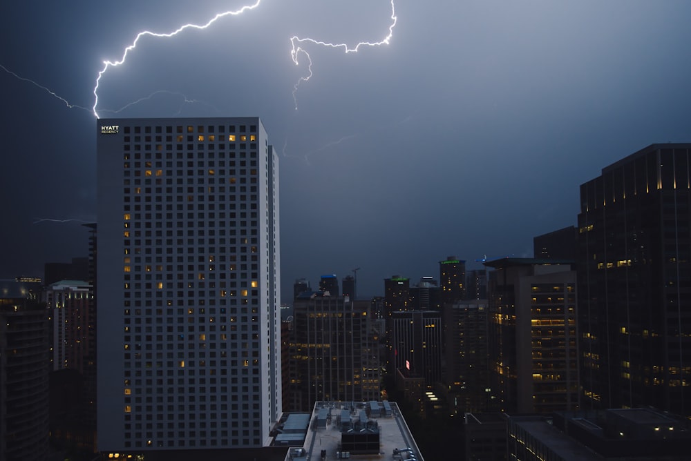 grey high rise building during nighttime