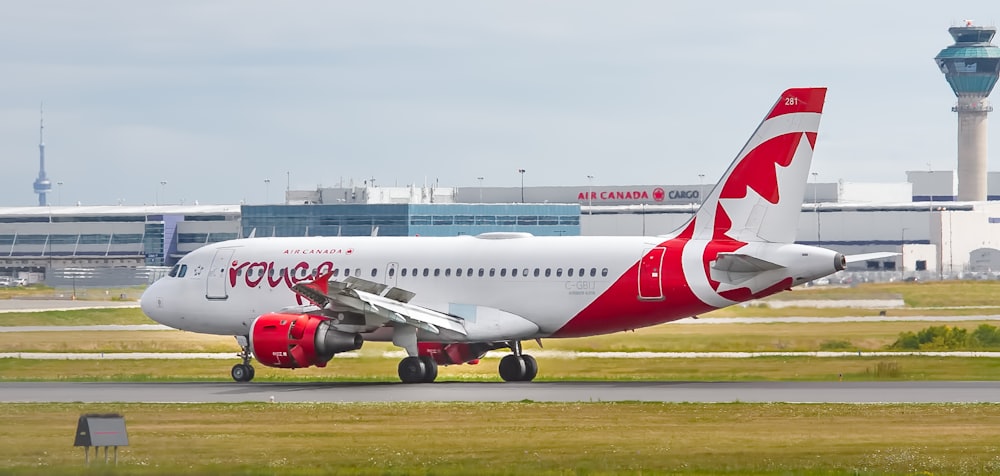 white and red plane