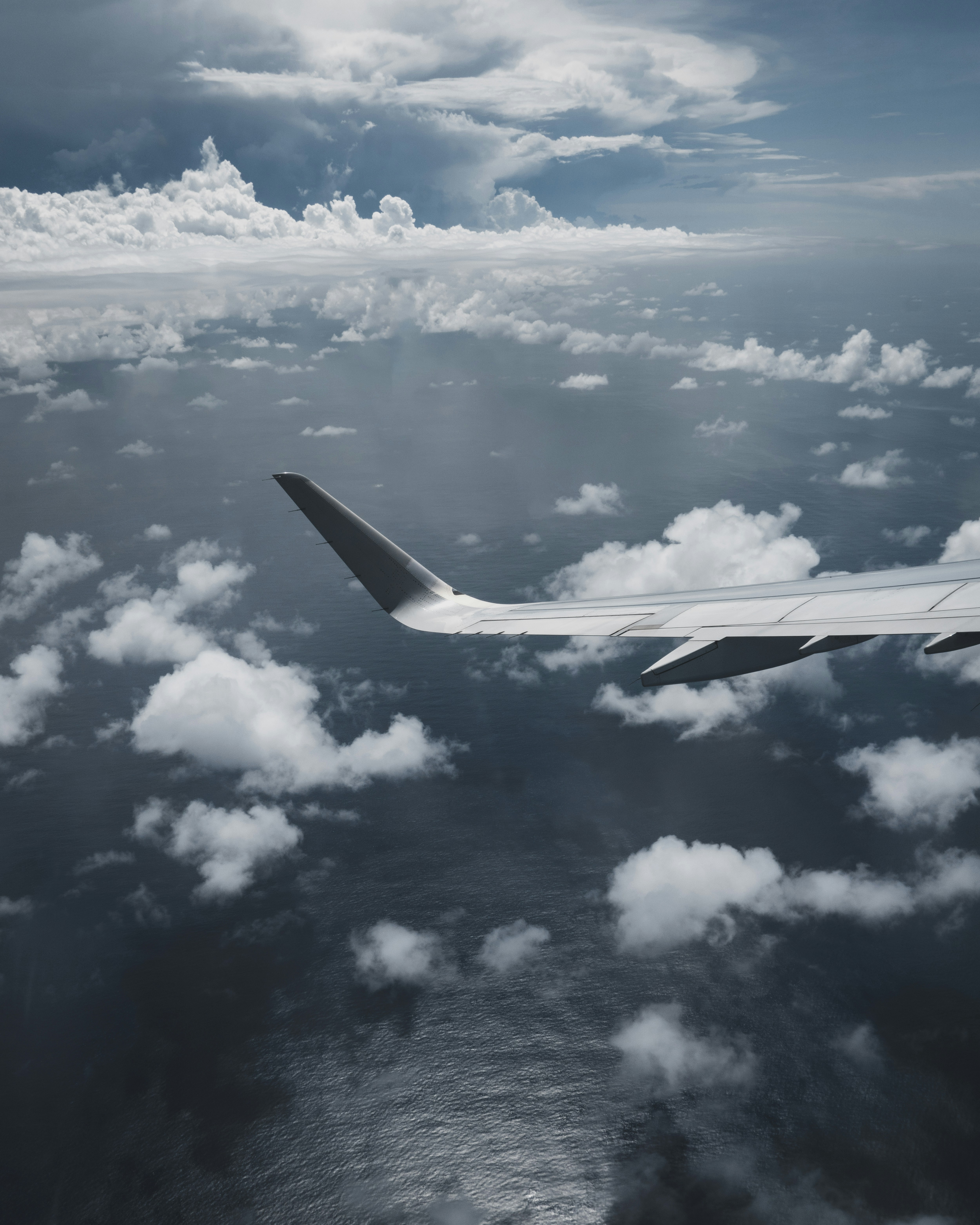 White clouds over white clouds during daytime photo – Free Airplane ...