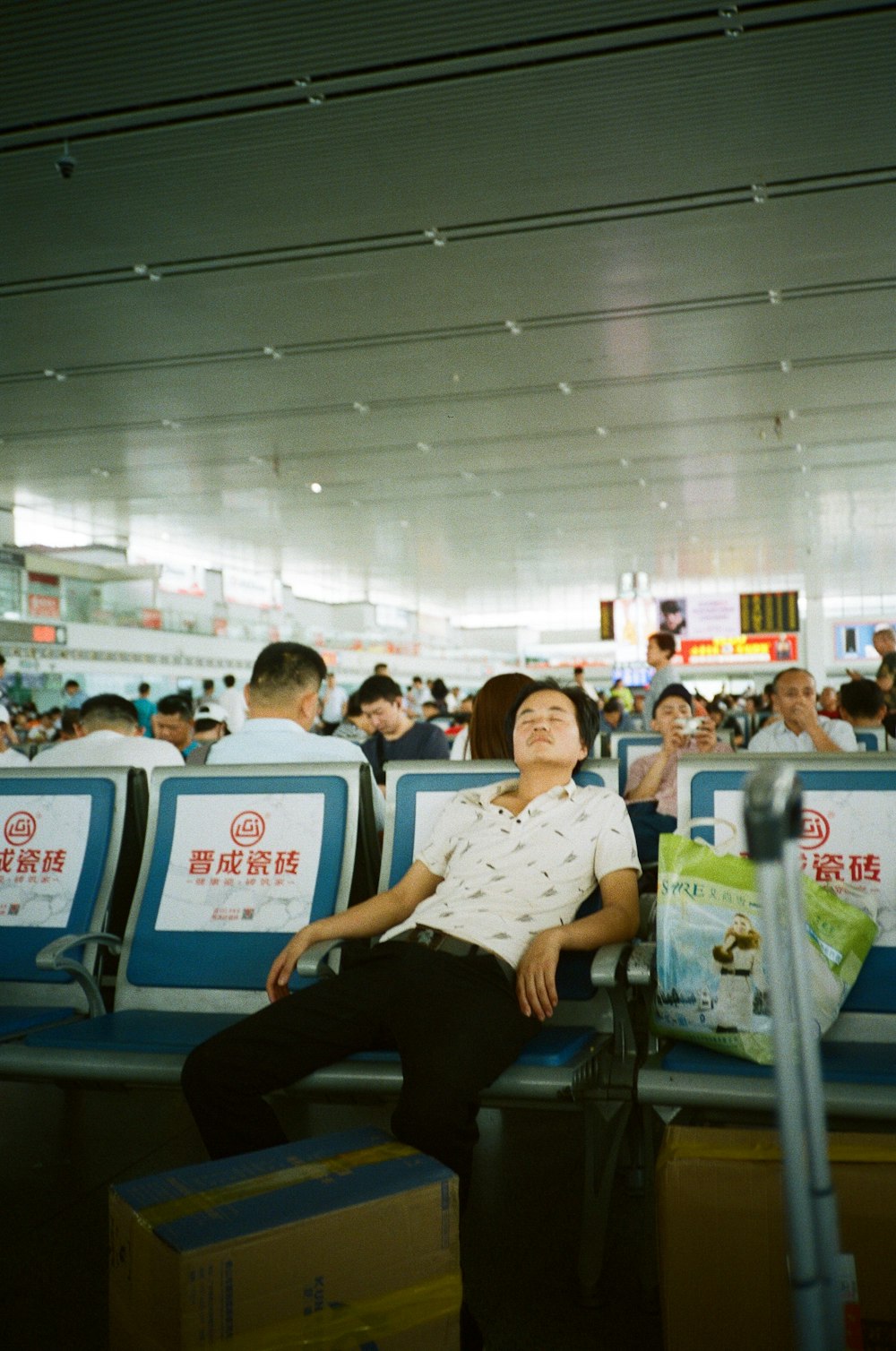 man sleeping on bench