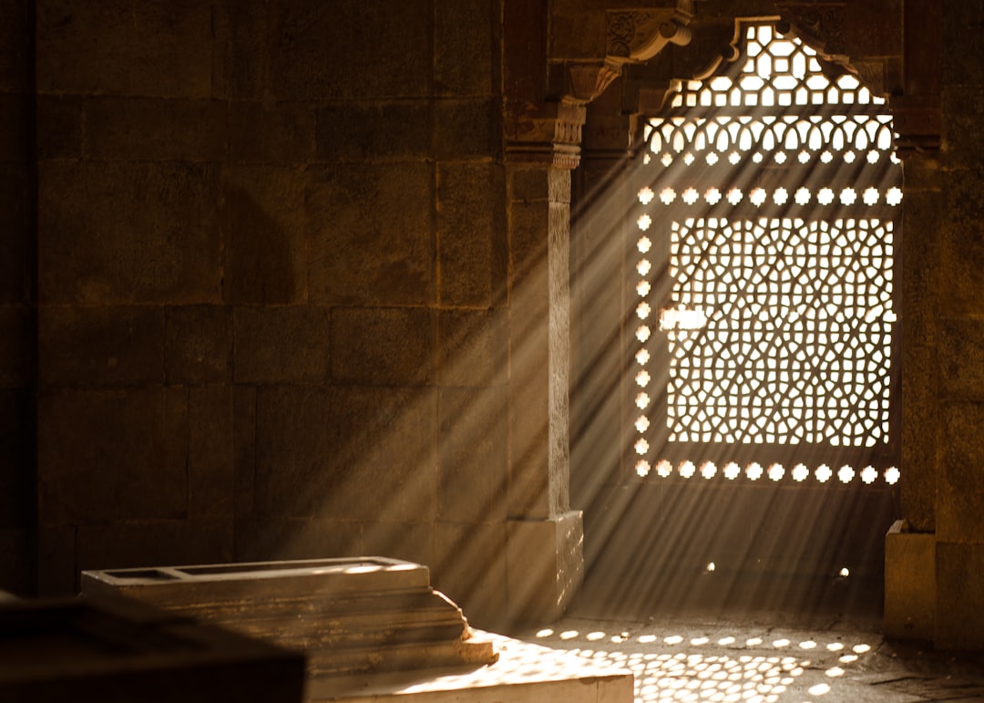 arch window with ray of sunlight