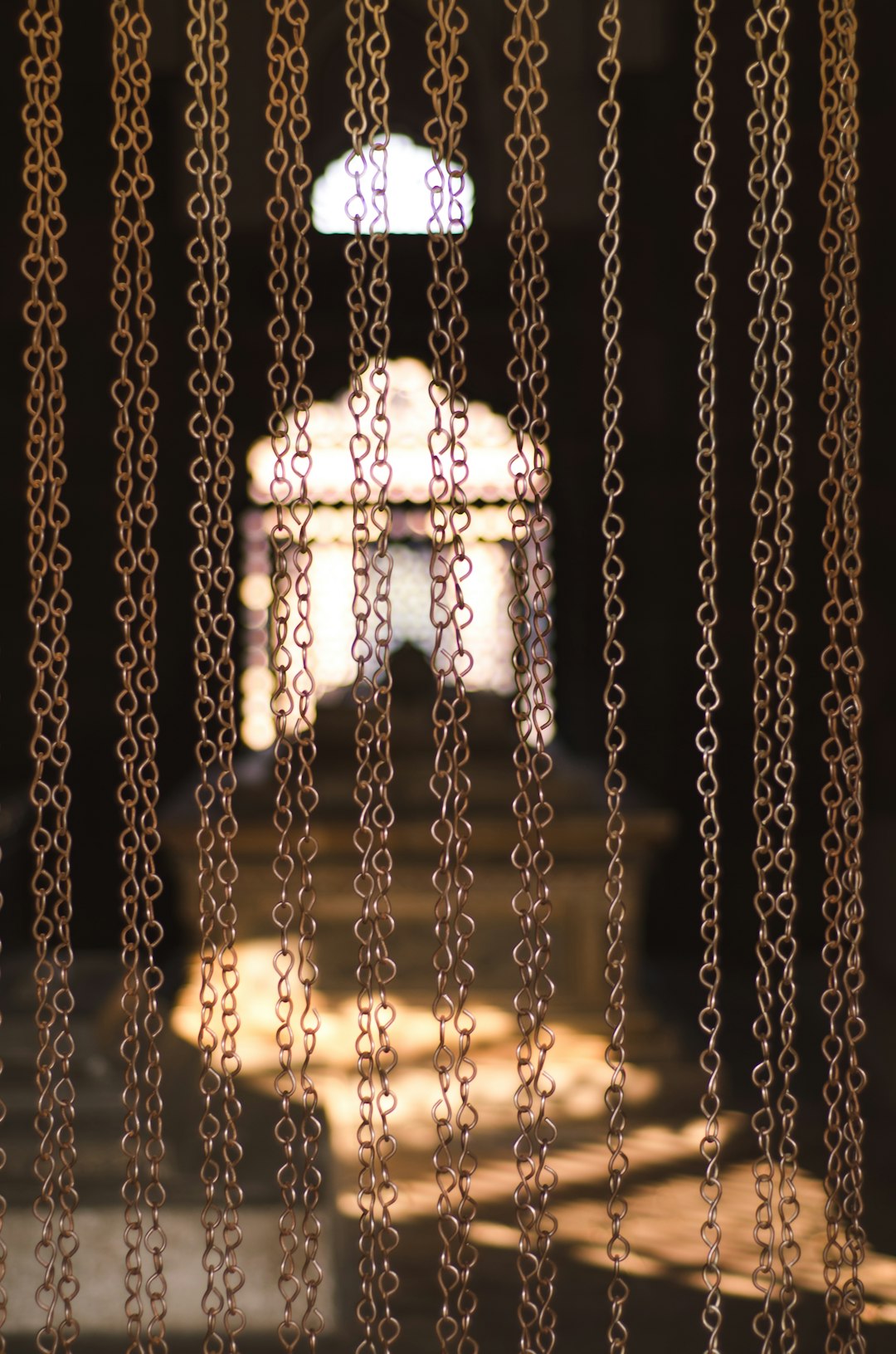 gold-colored chain curtain