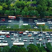 A panoramic view of vehicles lined up on a busy road, symbolizing multimodal travel options.