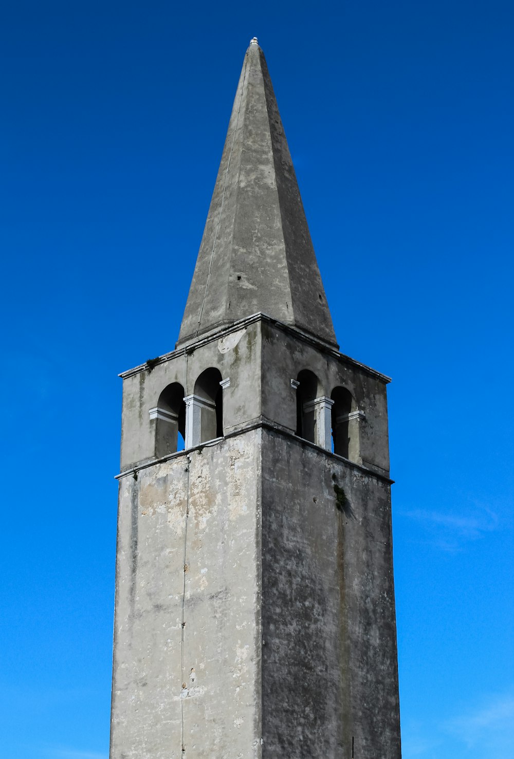 grey concrete tower during daytime
