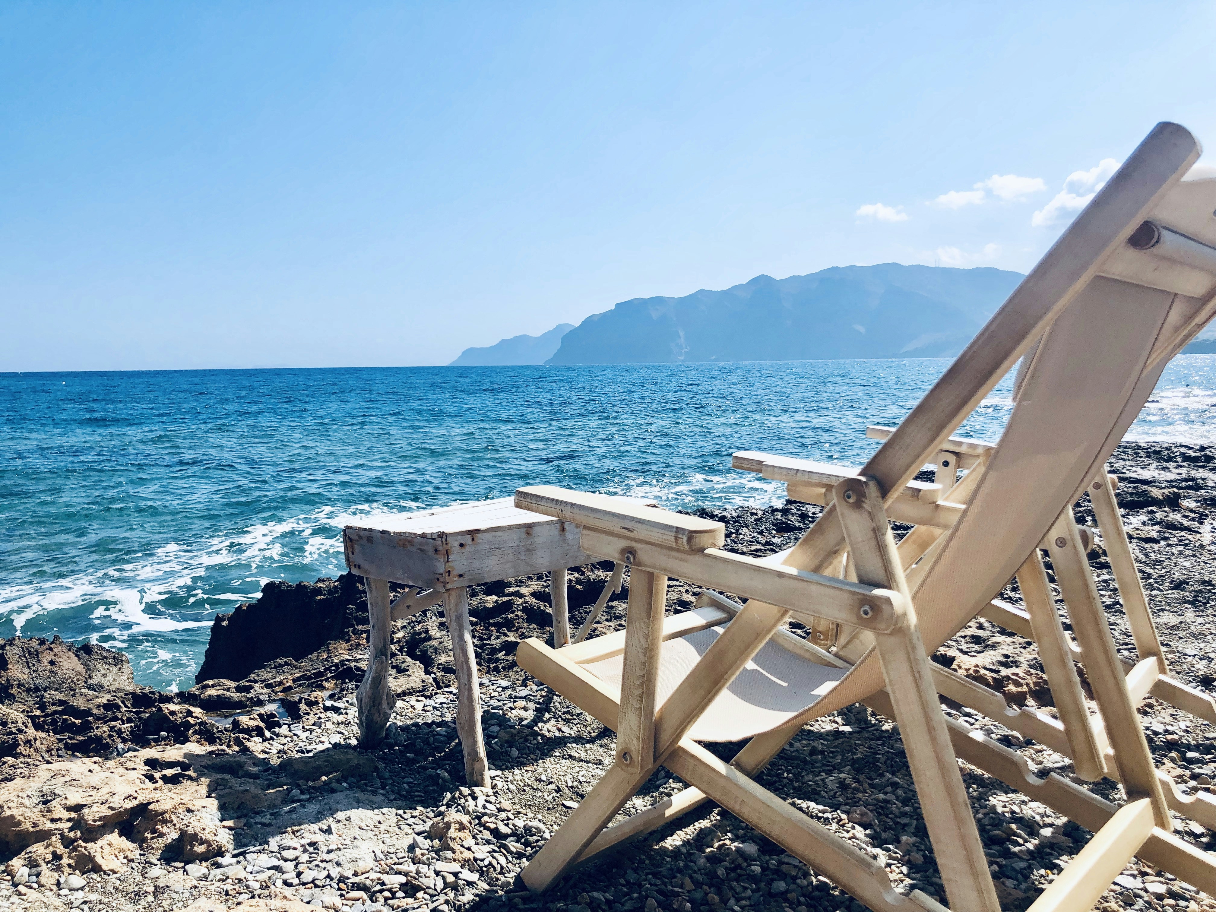 beige wooden adirondack chair