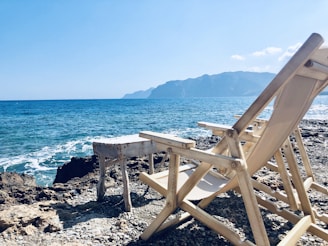 beige wooden adirondack chair