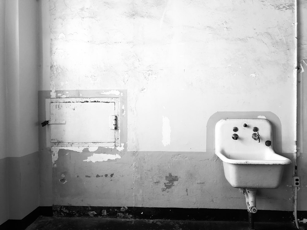 white wall sink