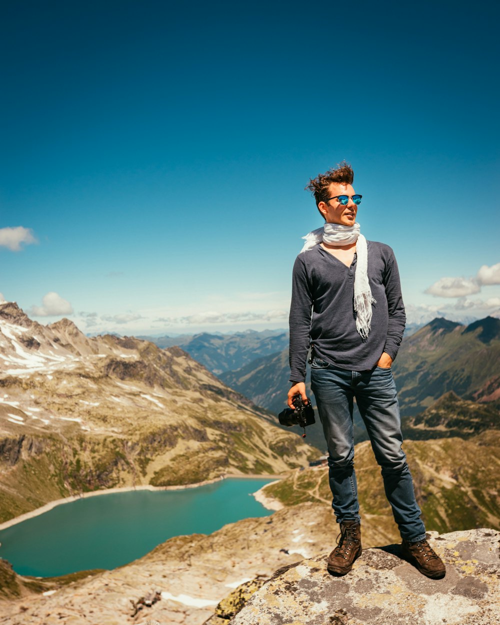 man standing on hill