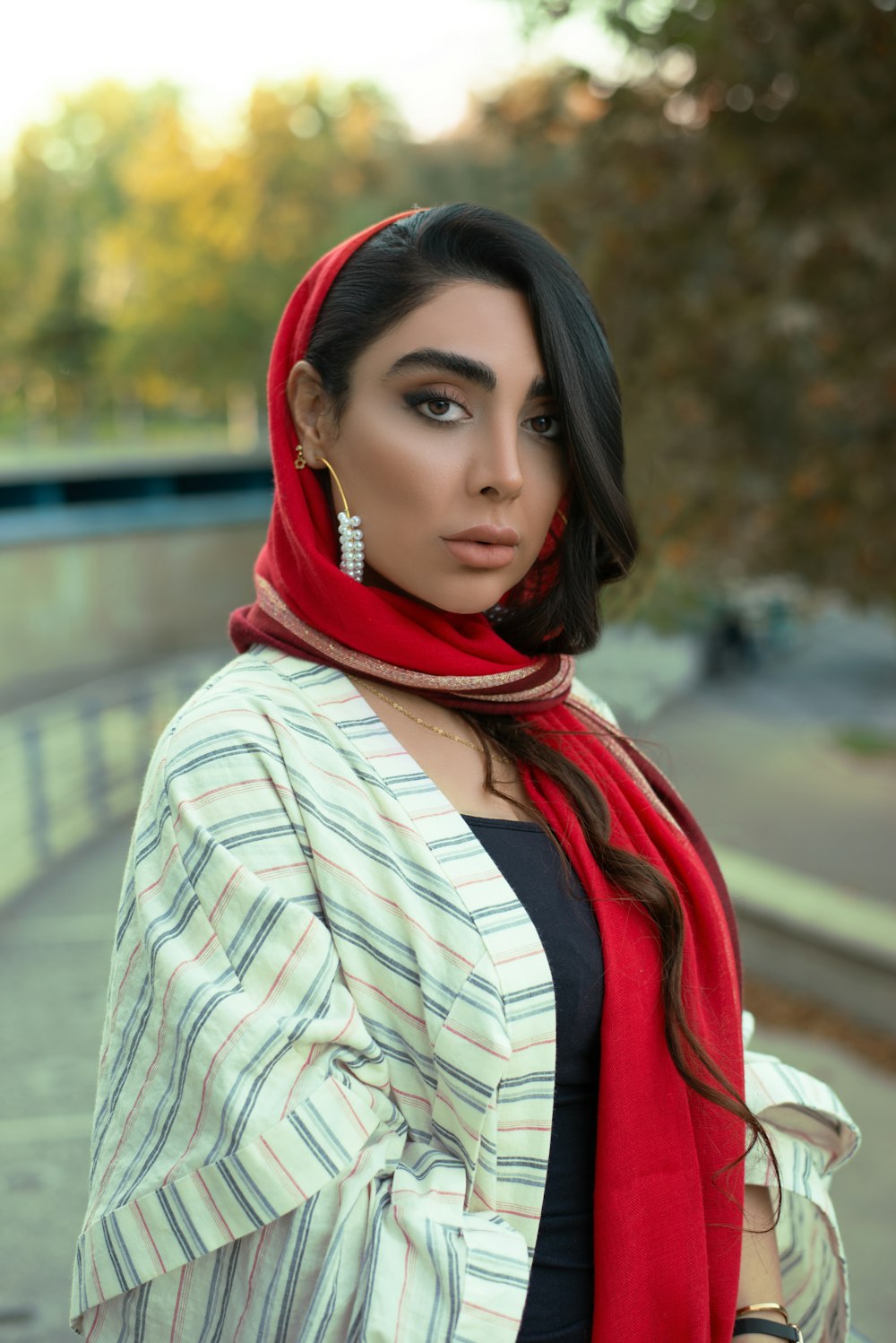 woman wearing white and black cardigan during daytime