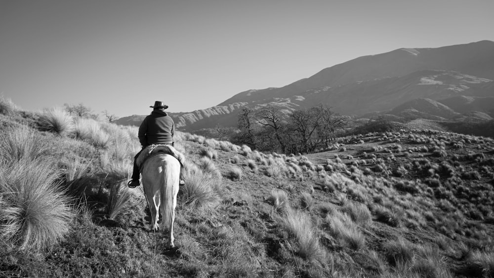 man riding on horse