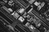 grayscale photography of high rise building