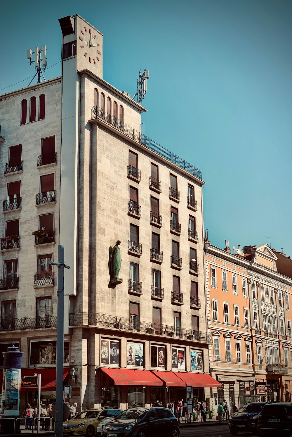 a tall building with a clock on the top of it