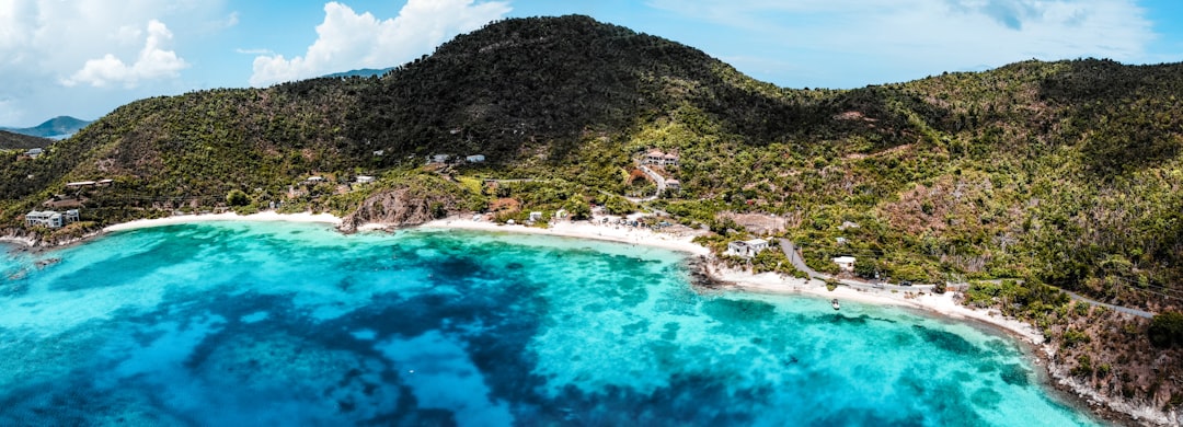 an aerial view of a tropical island in the middle of the ocean, Hansen Bay, St. John
