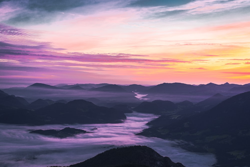 silhouette of mountains during sunset