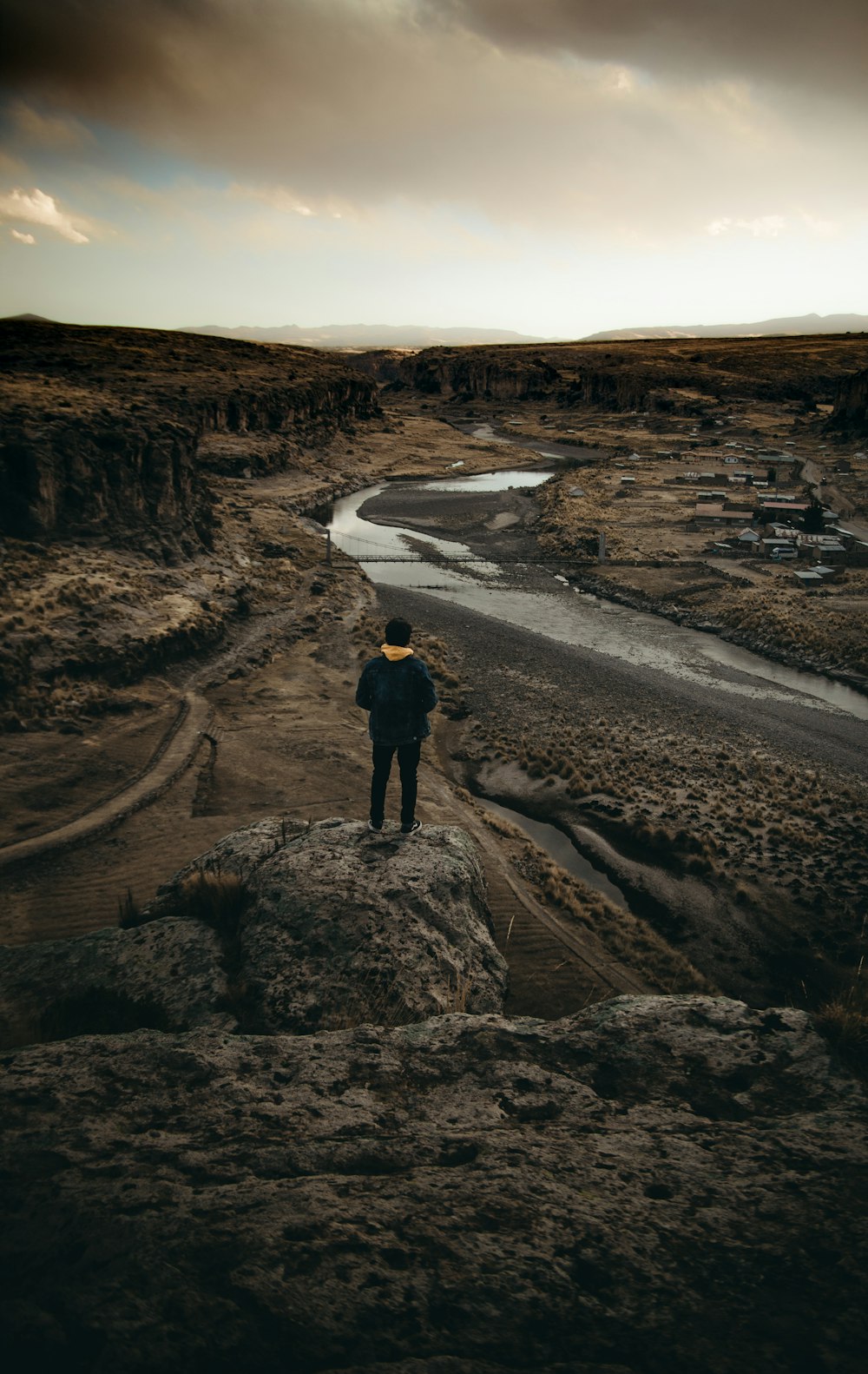 standing person wearing black pants