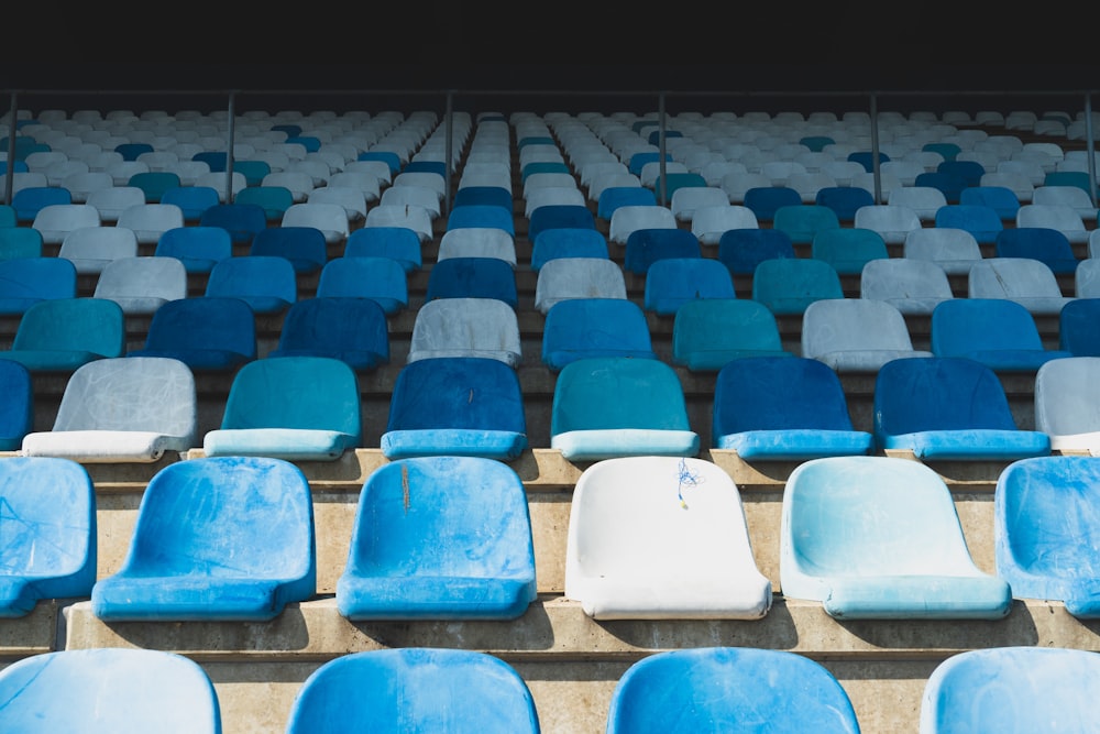 vacant blue armless chairs