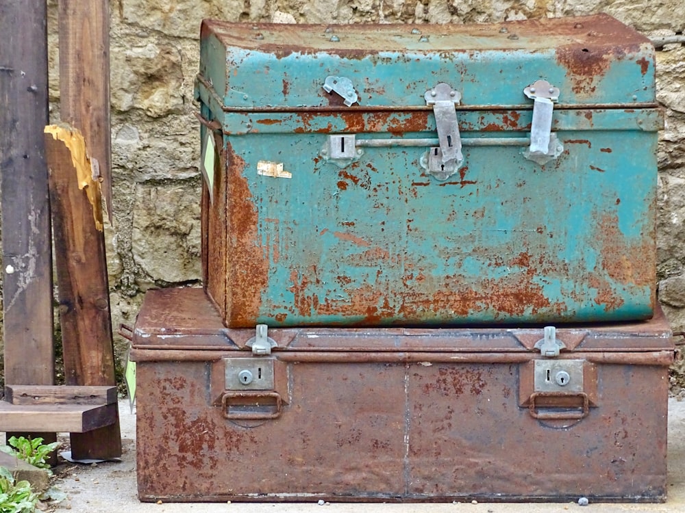 two rectangular blue and red metal containers