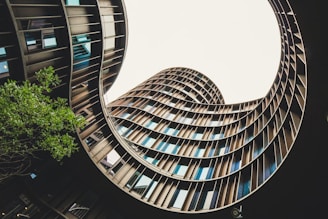 low-angle photography of brown building