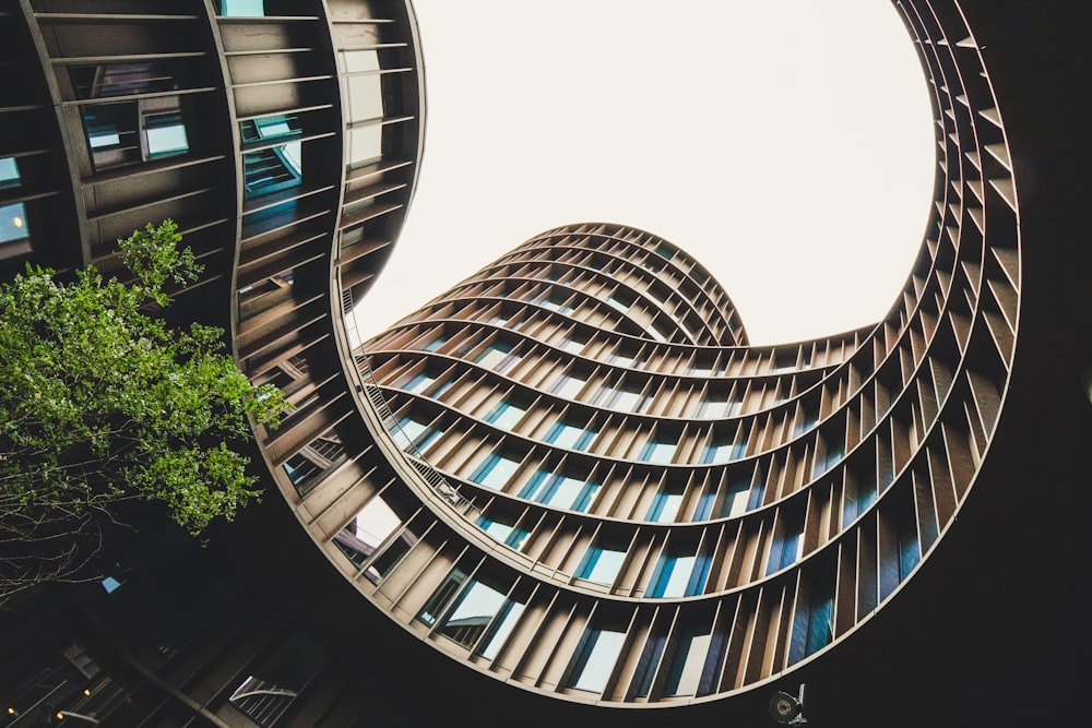 low-angle photography of brown building