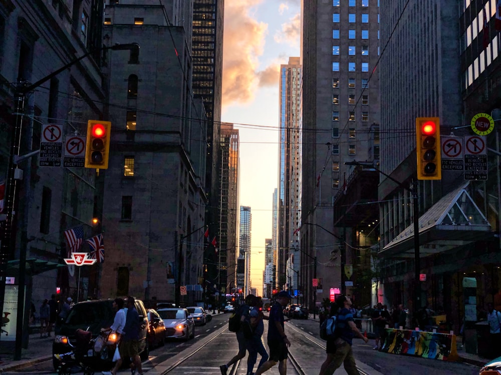 photography of people walking near street during daytime