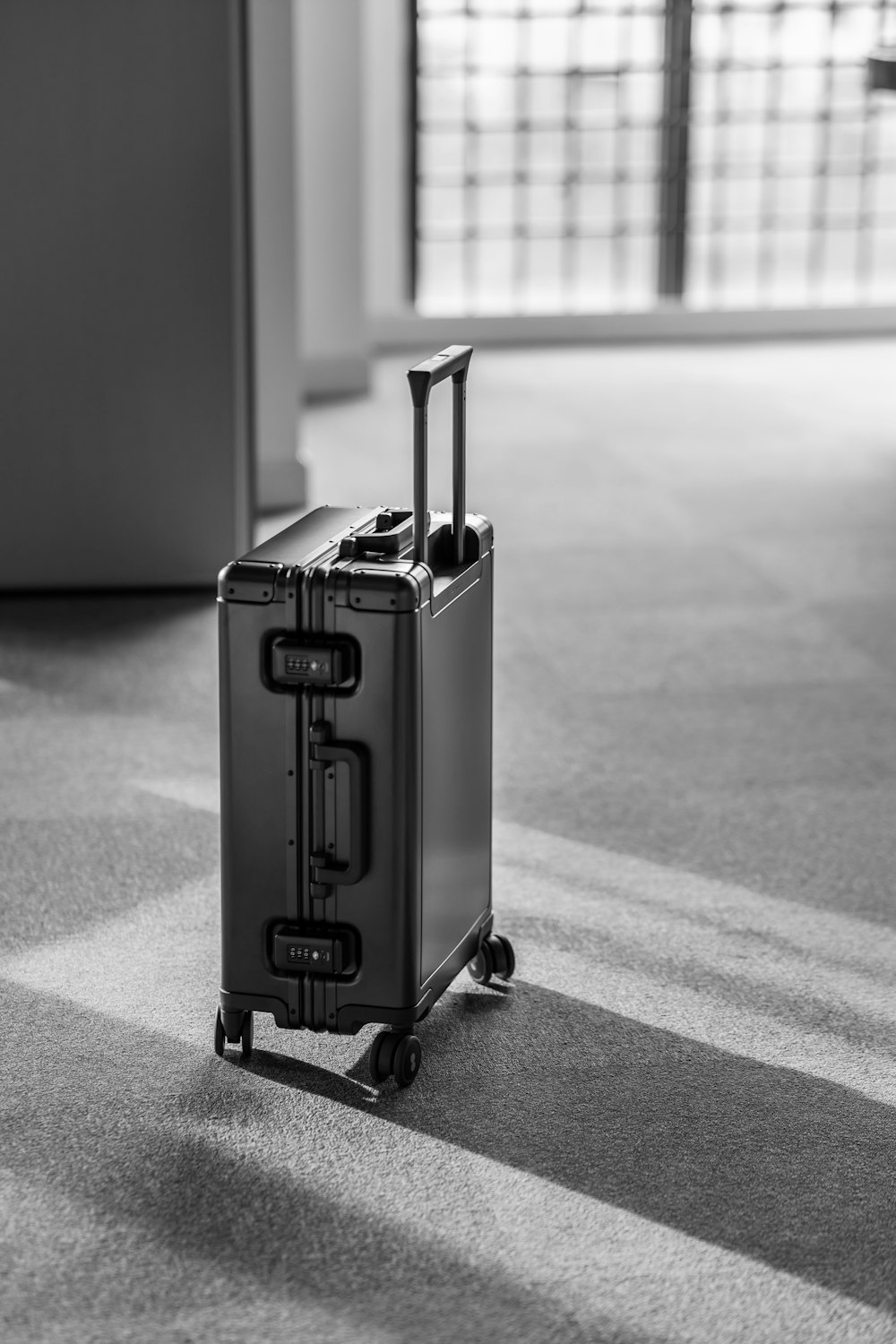 grey hard case luggage
