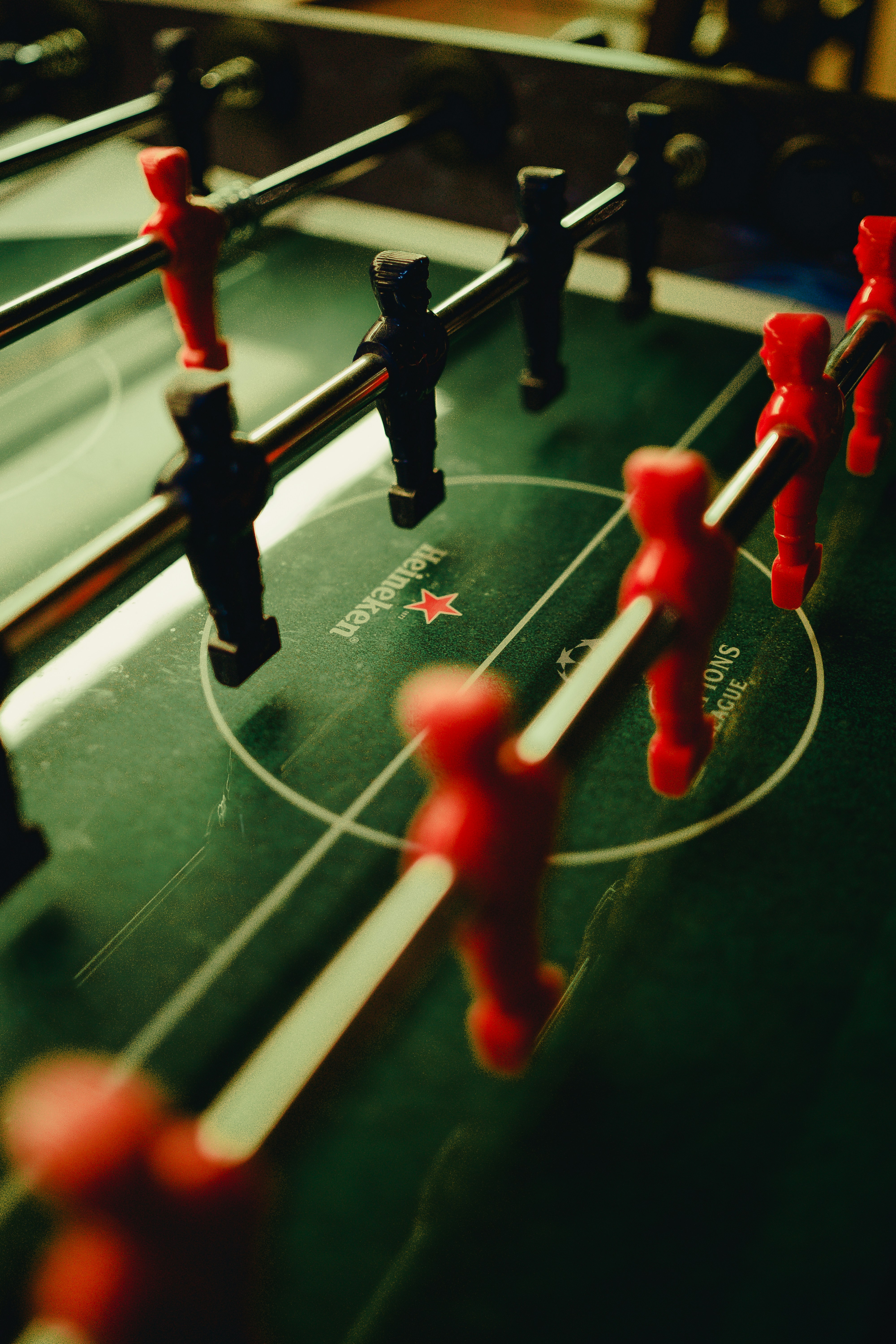 selective-focus photograph of foosball table