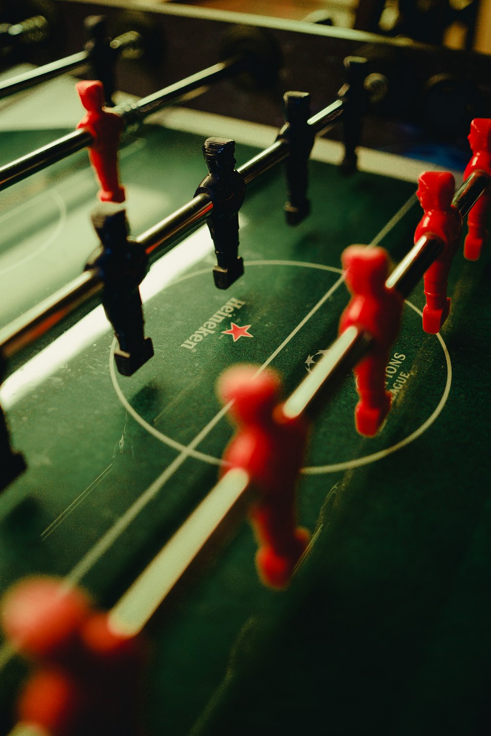 selective-focus photograph of foosball table